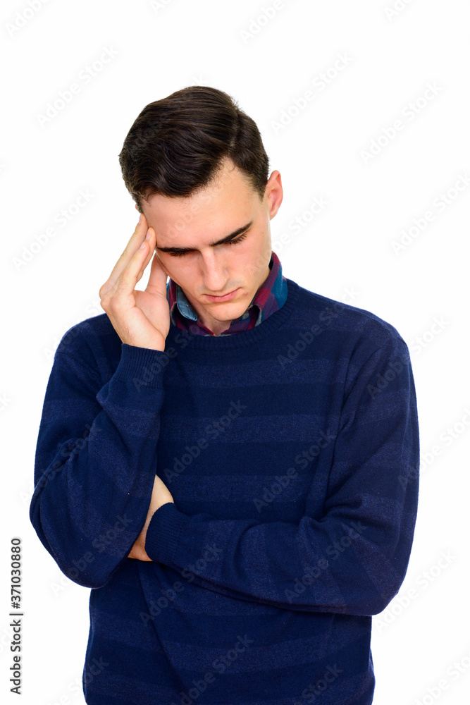 Studio shot of stressed Caucasian man thinking isolated against white background Studio shot of stressed Caucasian man thinking isolated against white background