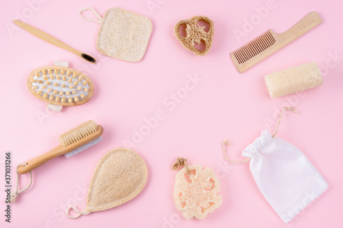 Set of sustainable toiletries and bathroom products on pink background. Eco friendly, zero waste concept.