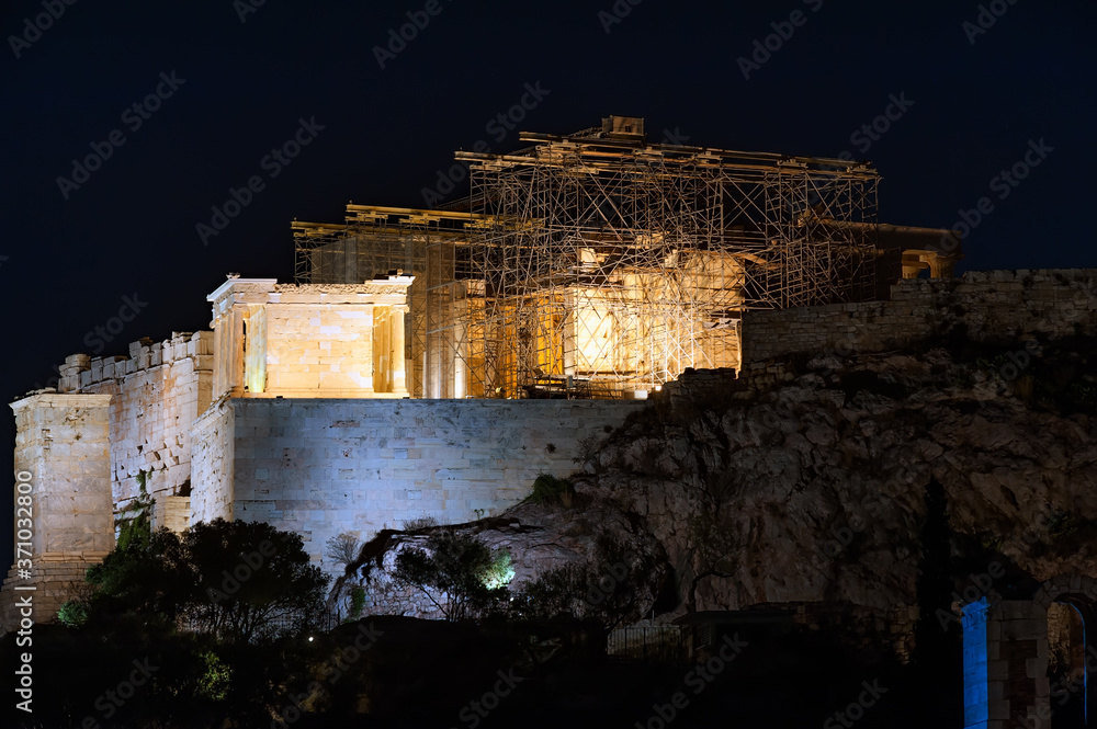 The night view to Odeon of Herodes Atticus of Athens in Greece