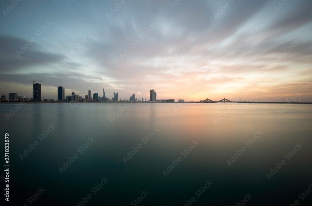Bahrain skyline with beautiful clouds during sunset