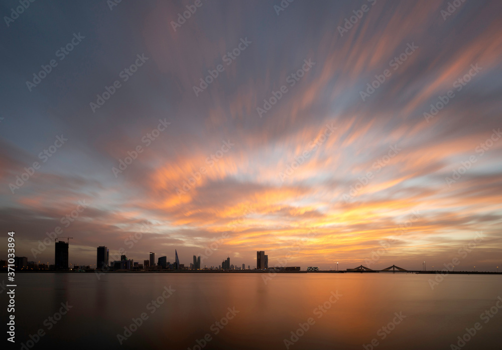 Bahrain skyline at dusk with beautiful clouds