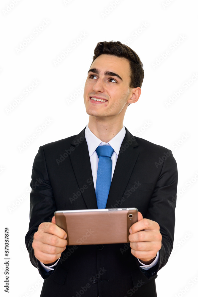 Portrait of happy young handsome businessman in suit Portrait of happy young handsome businessman in suit