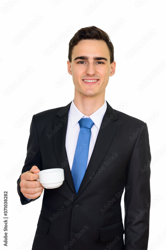 Portrait of happy young handsome businessman in suit Portrait of happy young handsome businessman in suit