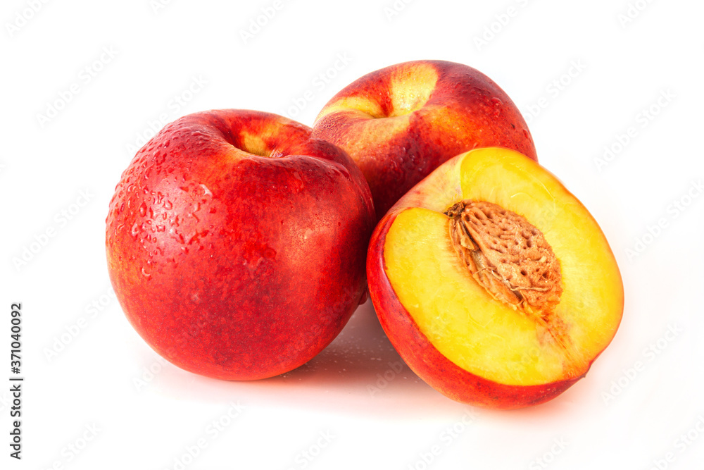 Peach or nectarine and peach slice with leaf on white background Peach or nectarine and peach slice with leaf on white background