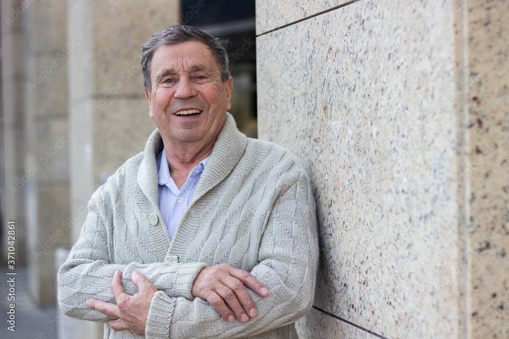 Obraz premium Portrait of happy senior man. Portrait of elderly man enjoying retirement