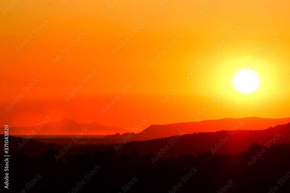 Obraz premium Sunset on the Tuscan Maremma.