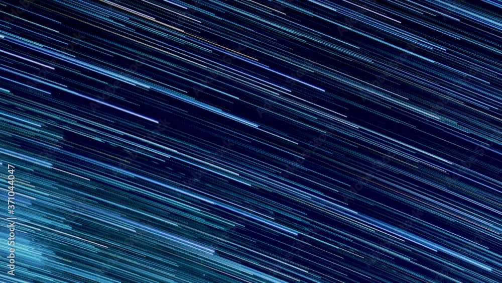 Star light trails form diagonal lines glowing across the dark night sky Star light trails form diagonal lines glowing across the dark night sky