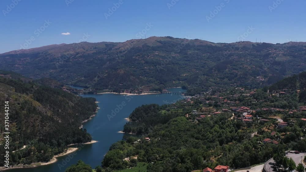 Amazing Landscape Scenery Of The Reservoir in Gerês, Portugal - aerial shot