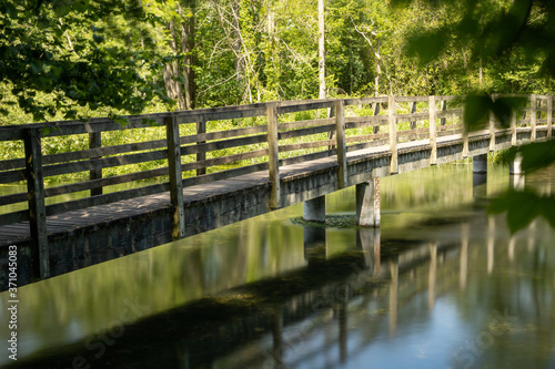 wooden bridge over the river