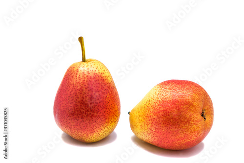 Two ripe juicy tasty pears on an isolated white background.