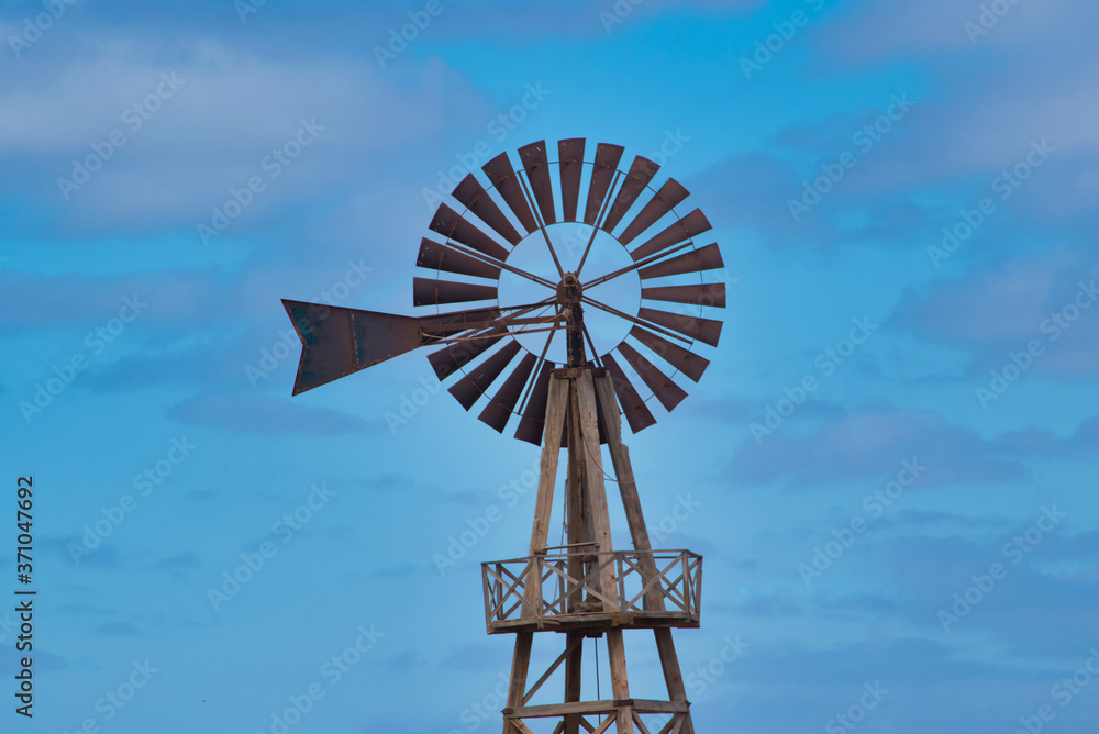 a view of a windmill in Lanzarote, Canary Islands a view of a windmill in Lanzarote, Canary Islands