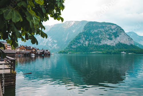 hallstatt city quay with beautiful view of lake and alpine range photo