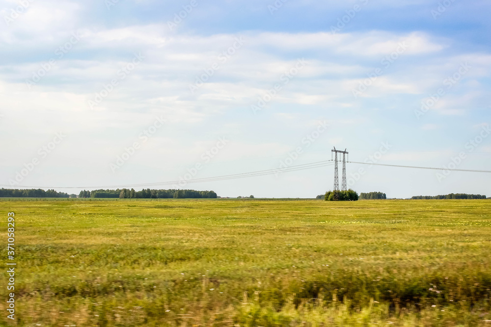 Beautiful landscape in Russia. The field goes to the horizon.