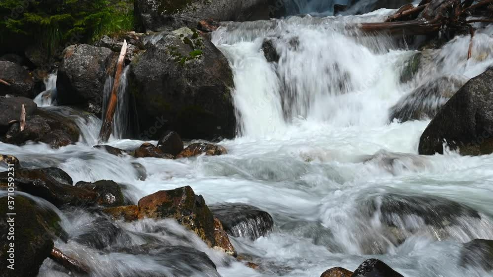 The current of the mountain river in a rocky line close-up 4k The current of the mountain river in a rocky line close-up 4k