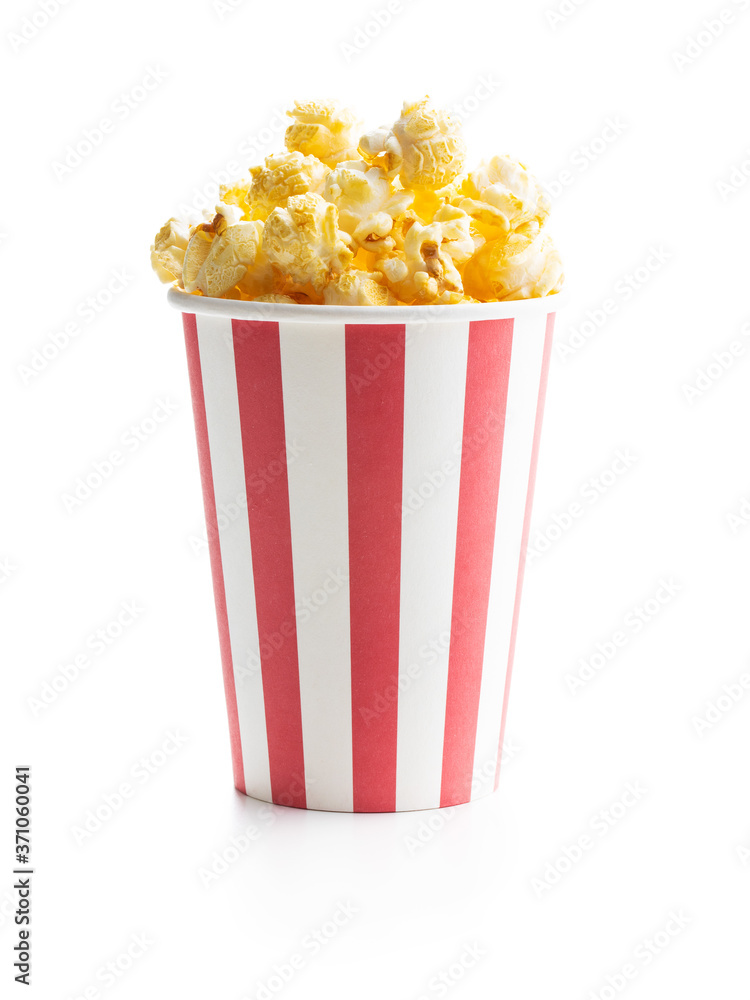 Sweet popcorn in striped paper cup. Sweet popcorn in striped paper cup.