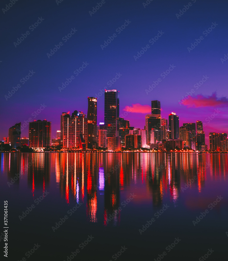 Naklejka premium miami florida usa skyline at night cityscape buildings reflection Brickell downtown urban panorama sunrise 