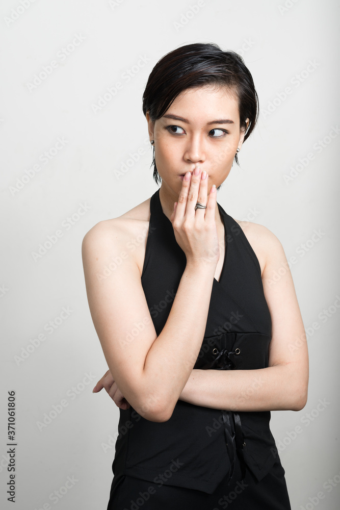 Portrait of young beautiful Asian woman with short hair Portrait of young beautiful Asian woman with short hair