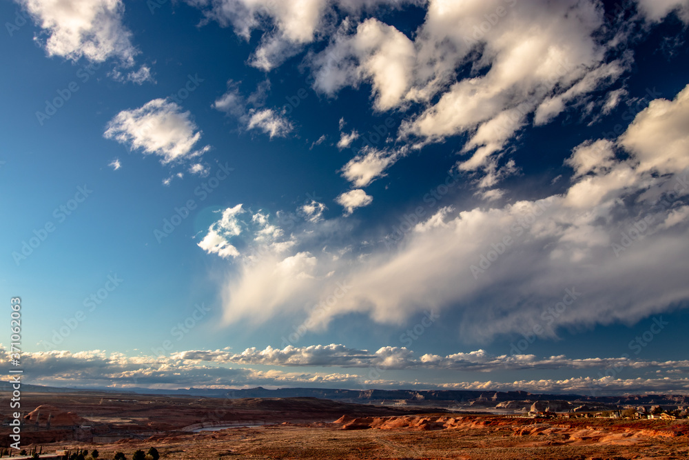 Mostly the sky and the clouds dominate the town under it - Page, AZ, USA Mostly the sky and the clouds dominate the town under it - Page, AZ, USA