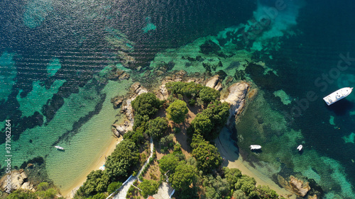 Aerial drone photo of popular paradise turquoise beach of Vromolimnos with small swamp next to it  Skiathos island  Sporades  Greece
