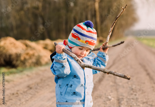 Toddler girl playing outdoors © amelie