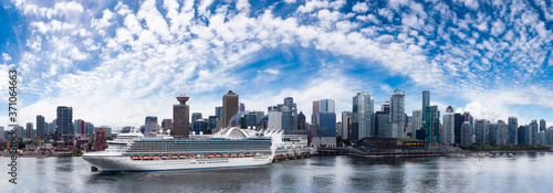 Fototapeta Naklejka Na Ścianę i Meble -  Vancouver, British Columbia, Canada. Panoramic View of Downtown City Skyline, Coal Harbour, Cruise Ship and Port during a sunny day.