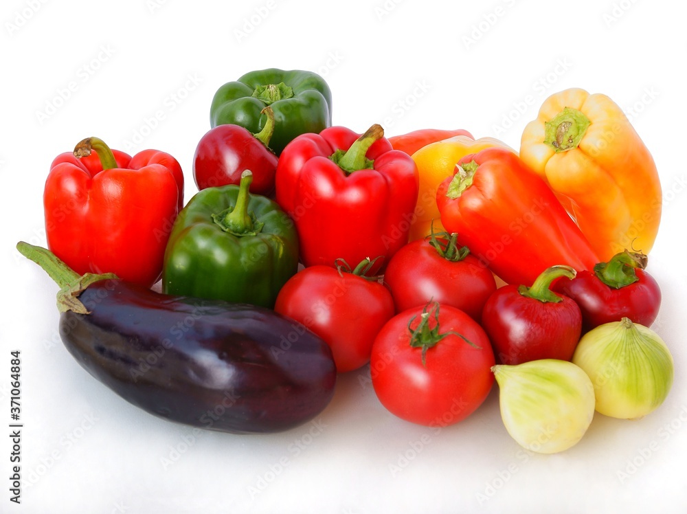 multicolor peppers,zzucchinies,egg-plants and other vegetables close up multicolor peppers,zzucchinies,egg-plants and other vegetables close up