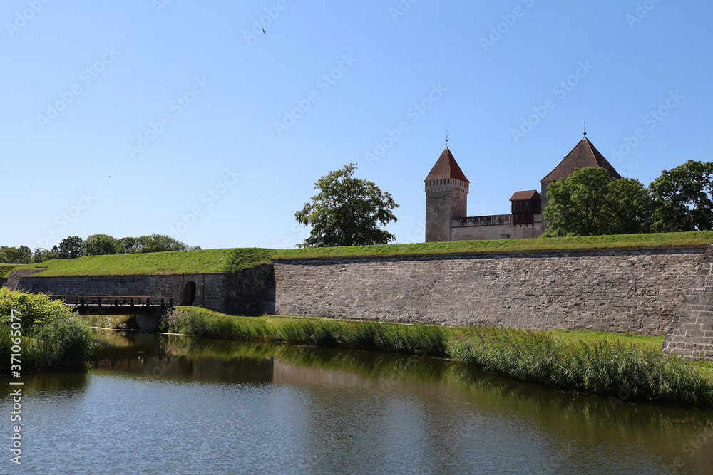 Entrance of the Kuressaare Castle on the island of Saaremaa in Estonia on a sunny day	