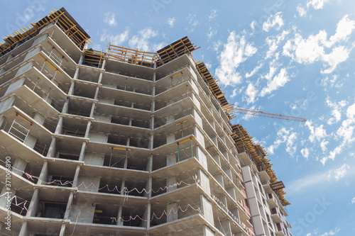 Building under construction. Construction of a concrete apartment building. Modern construction