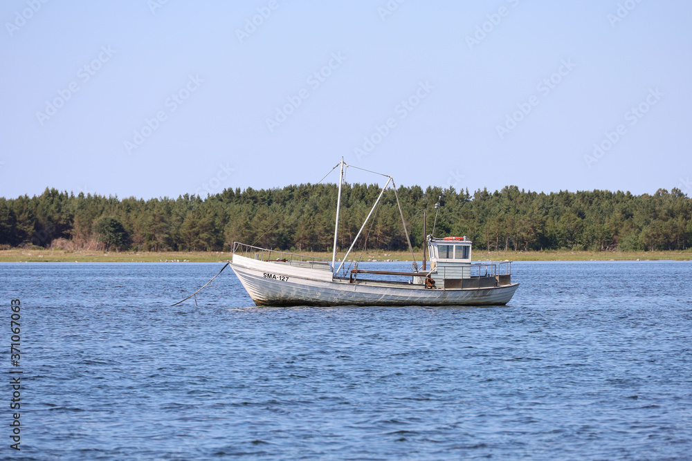 Fototapeta premium A fishing boat alone in the Baltic Sea off the island of Saaremaa in Estonia