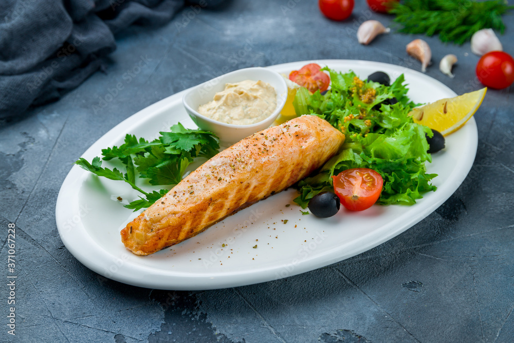 Salmon steak on the grill with sause tartar Salmon steak on the grill with sause tartar