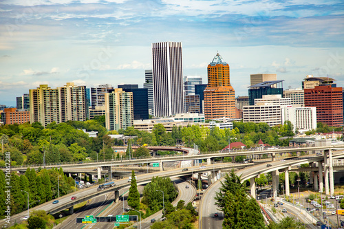 Portland, Oregon;  Buildings in Downtown Portland, Oregon, and a large freeway interchange just south of downtown.