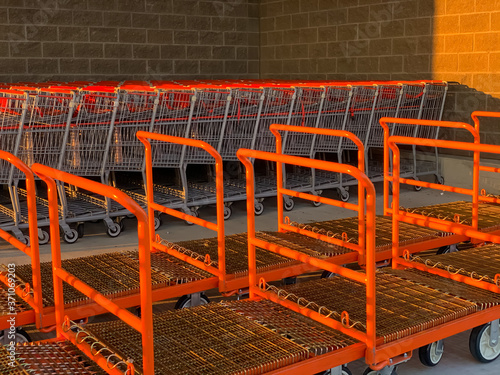 line up platform truck and shopping cart photo
