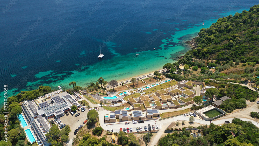 Aerial drone photo of small emerald paradise beach and resort of Xenia next to famous Koukounaries, Skiathos island, Sporades, Greece