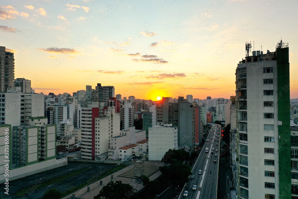 Sunset in the capital city, Sao Paulo, Brazil. Urban city life scene. Sunset view. Buildings scene, Capital city life scene. Buildings landscape. Sunset in the capital of Sao Paulo, Brazil. 