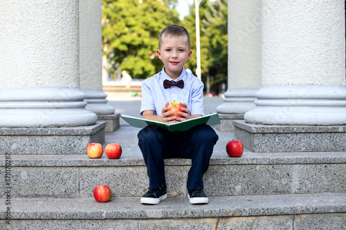 A first-grader boy goes to school for the first time. September 1. The beginning of the school year.School and education