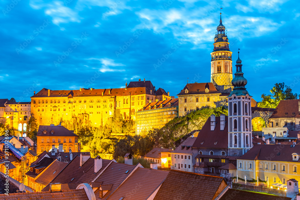 Cesky Krumlov by night. View of castle and old town houses, Czech Republic. UNESCO World Heritage Site