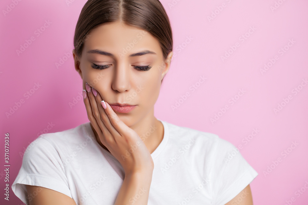 Tooth problems, an attractive woman is experiencing a painful toothache. Tooth problems, an attractive woman is experiencing a painful toothache.