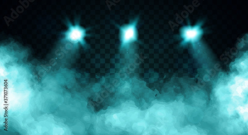 Billowing clouds of turquoise blue smoke illuminated by three spot lights over a dark background, colored vector illustration photo