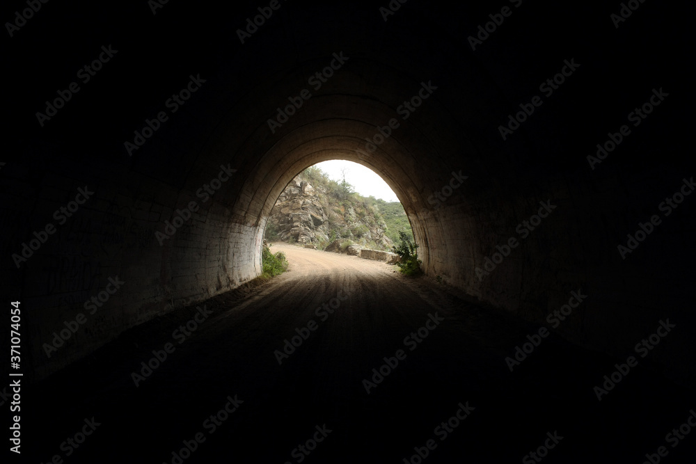 Transport and architecture. View of the dirt road from inside the Taninga tunnels in Cordoba, very high in the mountain.