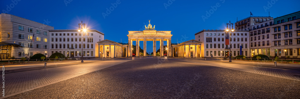 Brandenburg Gate in Berlin at night as panorama background