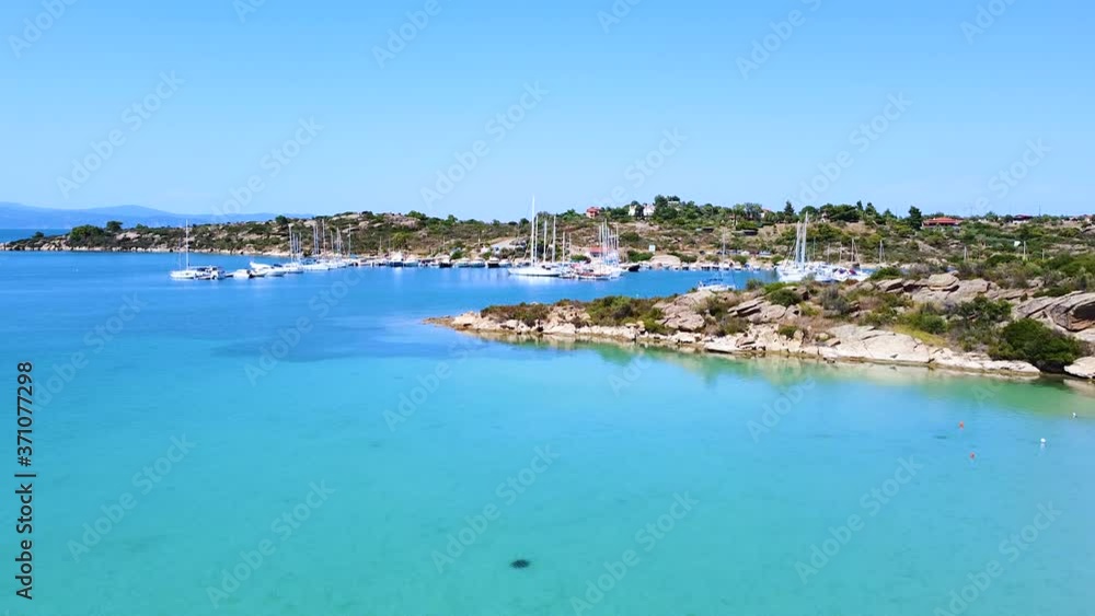 Ship port with ships and amazing blue azure sea. Aerial view Ship port with ships and amazing blue azure sea. Aerial view