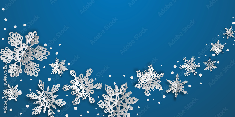 Christmas background with volume paper snowflakes with soft shadows on light blue background