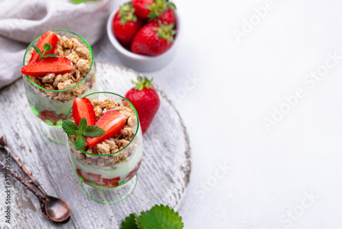 Dessert with strawberry, yogurt and granola
