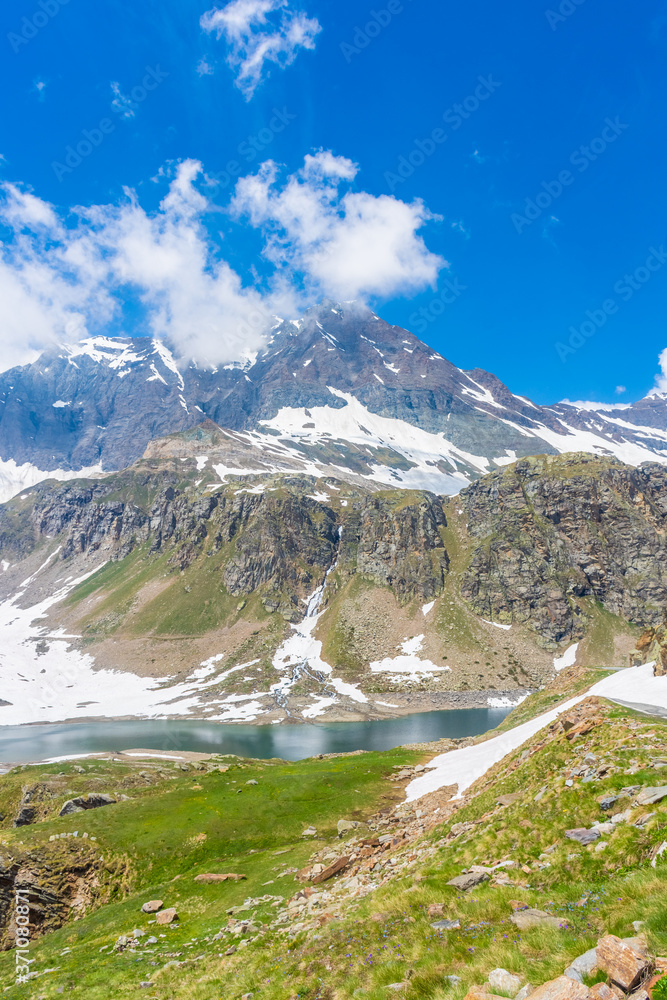 Colorful emerald lake inItalian Alps Colorful emerald lake inItalian Alps