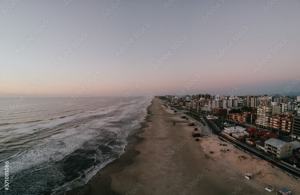 sunset at the beach from a drone perspective