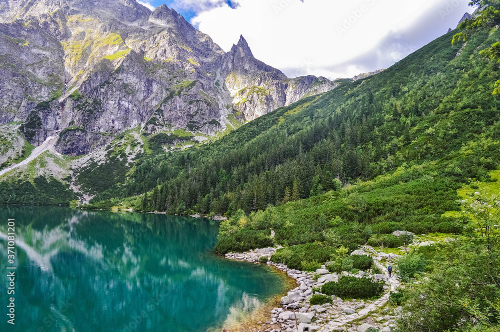The beautiful lake of Morskie Oko in the Tatra Mountains, near Zakopane, Poland - obrazy, fototapety, plakaty 