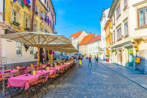 LJUBLJANA, SLOVENIA, 5th AUGUST 2019: Restaurant in the street of the historic center photo