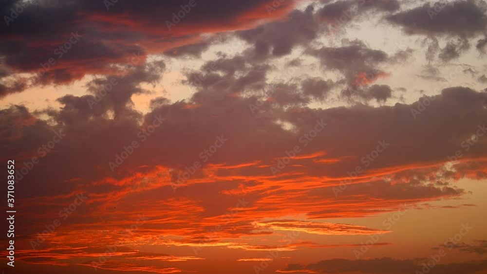 Late sunset a brilliancy of colors with hues of orange, pink, red, gray and yellow as evening descends. Spectacular clouds over the sea, off the coast of Istanbul at sunset time. 4K video Color graded Late sunset a brilliancy of colors with hues of orange, pink, red, gray and yellow as evening descends. Spectacular clouds over the sea, off the coast of Istanbul at sunset time. 4K video Color graded