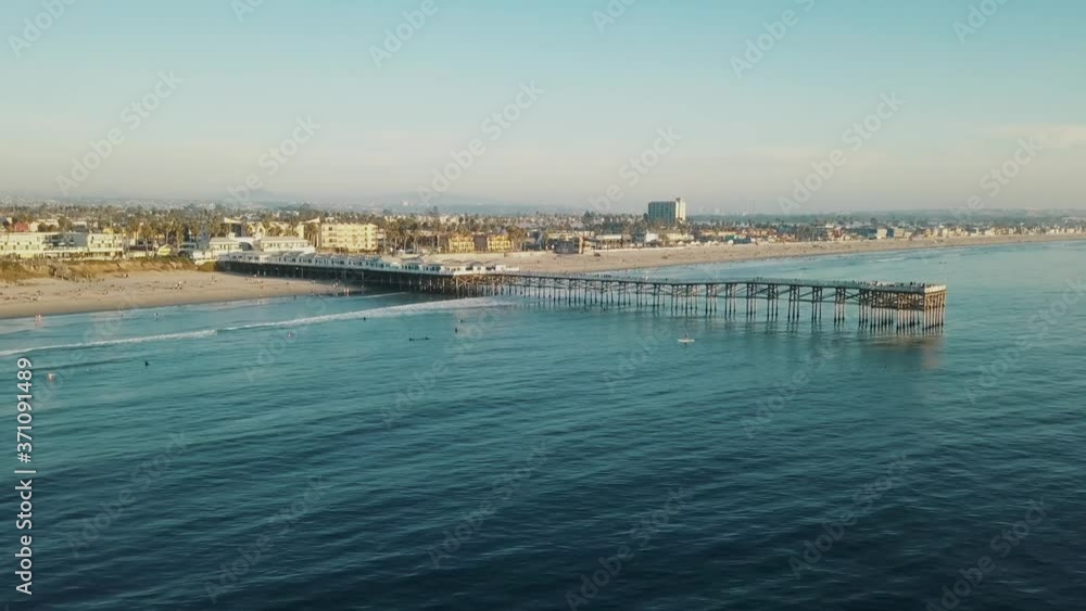 Beautiful 4k aerial shot of the Pacific Beach Pier bridge in San Diego California - Sightseeing - Tourist Attraction