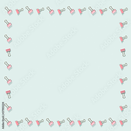 Wallpaper Mural Frame from office supplies, pink metal paper clips. Torontodigital.ca
